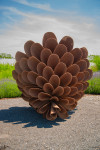 The large pine cone sculptures by Floyd Elzinga have become beloved and collected classics that now grace many public venues in the country. Image 5