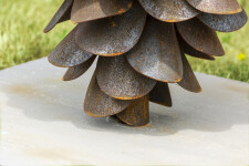 This contemporary outdoor sculpture of a pine cone made from steel is by Floyd Elzinga. Image 8