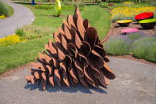 The large pine cone sculptures by Floyd Elzinga have become beloved and collected classics that now grace many public venues in the country. Image 2