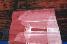 Vertical composition on paper with a saturated wine red ground over which bristle brushed lines are cross hatched in black and royal blue. Image 2