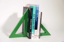 Two striking triangles in bright apple green steel; their center cut-out triangles stand beside one another in this new tabletop sculpture b… Image 7