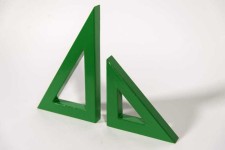 Two striking triangles in bright apple green steel; their center cut-out triangles stand beside one another in this new tabletop sculpture b… Image 2