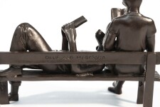 Captured reading books, this contemporary bronze figurative sculpture is by Gillie and Marc. Image 4