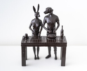 This contemporary figurative bronze tabletop sculpture featuring a hybrid dog and rabbit as chefs is by Gillie and Marc.