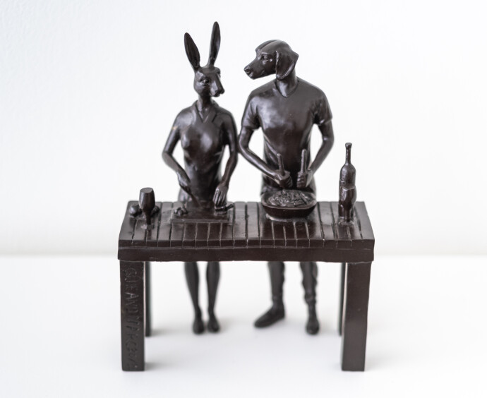 This contemporary figurative bronze tabletop sculpture featuring a hybrid dog and rabbit as chefs is by Gillie and Marc.