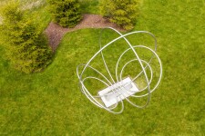Canadian artist Jake Goertzen creates a symmetrical design with six stainless steel rings in this elegant outdoor sculpture. Image 6