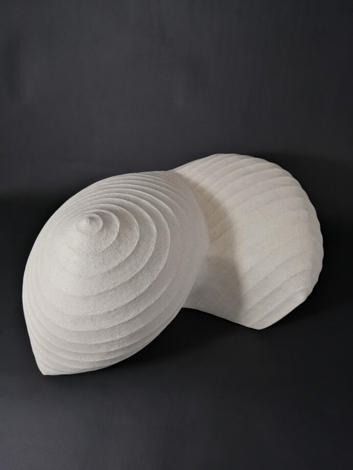 This abstract ceramic indoor sculpture was inspired by nature.