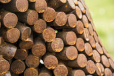 This figurative outdoor sculpture is forged from steel. Image 8