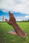 A massive hand appears to rise out of the earth in this engaging sculpture by Mississippi artist, Jason Kimes. Image 2