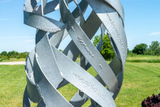Jean-Marc Tétrault’s abstract sculptures can be found in many public venues including his own township in Quebec where he created a steel sc… Image 6