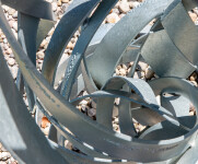 Jean-Marc Tétrault’s abstract sculptures can be found in many public venues including his own township in Quebec where he created a steel sc… Image 11