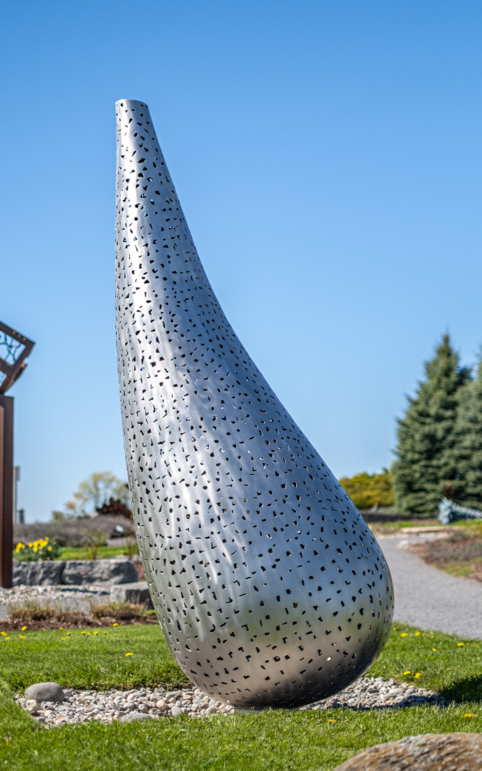 This contemporary outdoor monumental metal sculpture is by Jean-Pierre Morin.