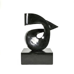 This contemporary abstract black stone sculpture is by Jeremy Guy.