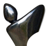Smooth-surfaced, black granite has been engineered and sculpted into an elegant and classic depiction of a human figure by Jeremy Guy. Image 5