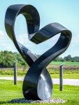 Smooth black granite has been engineered to resemble a treble clef in this elegant outdoor sculpture by Canadian artist Jeremy Guy. Image 7