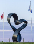Smooth black granite has been engineered to resemble a treble clef in this elegant outdoor sculpture by Canadian artist Jeremy Guy. Image 8