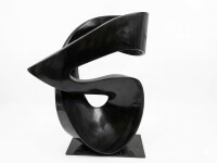 This contemporary abstract black stone sculpture is by Jeremy Guy. Image 2