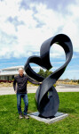 Smooth black granite has been engineered to resemble a treble clef in this elegant outdoor sculpture by Canadian artist Jeremy Guy. Image 10