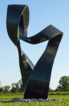 Smooth black granite has been engineered to resemble a treble clef in this elegant outdoor sculpture by Canadian artist Jeremy Guy. Image 9