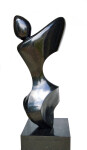 Smooth-surfaced, black granite has been engineered and sculpted into an elegant and classic depiction of a human figure by Jeremy Guy. Image 4