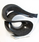 Smooth-surfaced, black granite flecked almost imperceptibly with copper and white has been engineered into an elegant ribbon in tangible con… Image 2