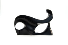 This abstract figurative sculpture is made of engineered black granite by Jeremy Guy. Image 3