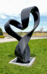 Smooth black granite has been engineered to resemble a treble clef in this elegant outdoor sculpture by Canadian artist Jeremy Guy. Image 4