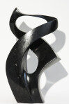 Sculptor Jeremy Guy’s lyrical and moving abstract representation of a human embrace is created from engineered black granite. Image 7