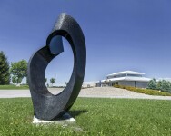 Engineered black granite is sculpted by Jeremy Guy into an elegant swirling abstraction inspired by the flocking behaviour of starlings. Image 9