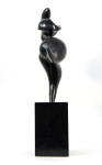 The graceful form of a female figure emerges from hand-chiselled black granite in this classically elegant sculpture by Jeremy Guy. Image 2