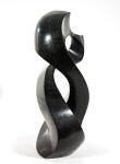 Smooth-surfaced, engineered black granite is sculpted into an elegant figure eight by Jeremy Guy. Image 7