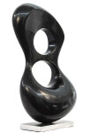 Smooth-surfaced, black granite has been engineered into an elegant figure eight shape by sculptor Jeremy Guy. Image 2