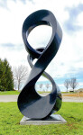 Smooth black granite has been engineered to resemble a treble clef in this elegant outdoor sculpture by Canadian artist Jeremy Guy. Image 2