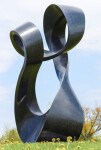 Smooth black granite has been engineered to resemble a treble clef in this elegant outdoor sculpture by Canadian artist Jeremy Guy. Image 3