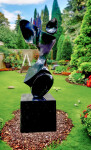 Smooth-surfaced, black granite has been engineered and sculpted into an elegant and classic depiction of a human figure by Jeremy Guy. Image 8