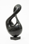 With its fluid and elegant lines, this abstract stone sculpture by Jeremy Guy appears to resemble a figure eight. Image 11