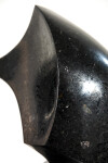 Smooth-surfaced, engineered black granite is sculpted into an elegant figure eight by Jeremy Guy. Image 4