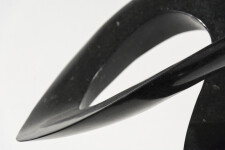 Smooth-surfaced, engineered black granite is sculpted into an elegant, spinning form by Jeremy Guy. Image 5