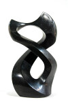 Smooth-surfaced, engineered black granite is sculpted into an elegant figure eight by Jeremy Guy. Image 6