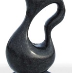 Smooth surfaced, black granite has been engineered into an elegant organic shape by sculptor Jeremy Guy. Image 3