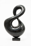 With its fluid and elegant lines, this abstract stone sculpture by Jeremy Guy appears to resemble a figure eight. Image 10