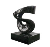 This contemporary abstract black stone sculpture is by Jeremy Guy. Image 3