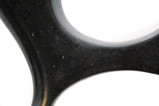 Smooth-surfaced, black granite has been engineered into an elegant figure eight shape by sculptor Jeremy Guy. Image 4