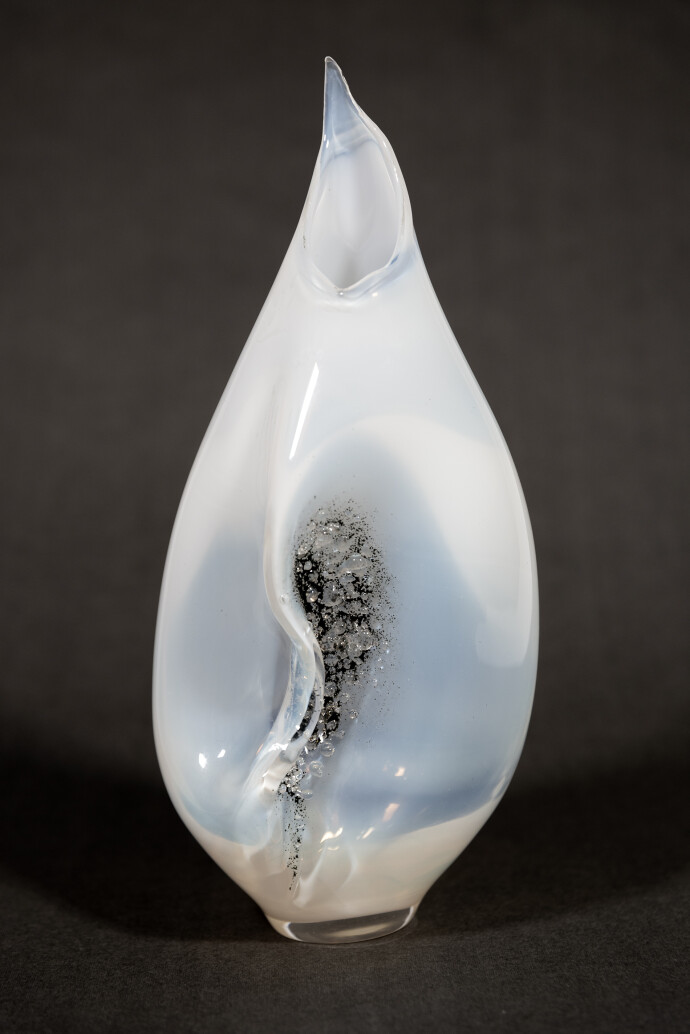 This modern glass black and white vase by Julia Reimer is inspired by nature.