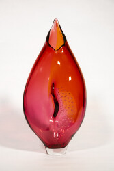 This modern glass red and pink vase by Julia Reimer is inspired by nature.