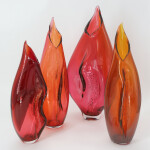 This modern glass grouping of vases in shades of red is by Julia Reimer. Image 2
