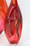 This modern glass grouping of vases in shades of red is by Julia Reimer. Image 4