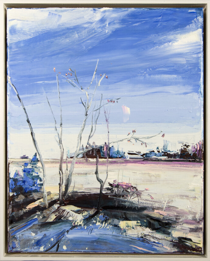 Bare trees set against a dramatic blue sky hug the shoreline in this dreamy landscape by Julie Himel.