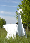 This contemporary metal garden sculpture is made in the form of a white swan. Image 4