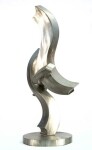 Free flowing, the elegant s-shaped curves of this sculpture were created by American artist, Kevin Robb. Image 3